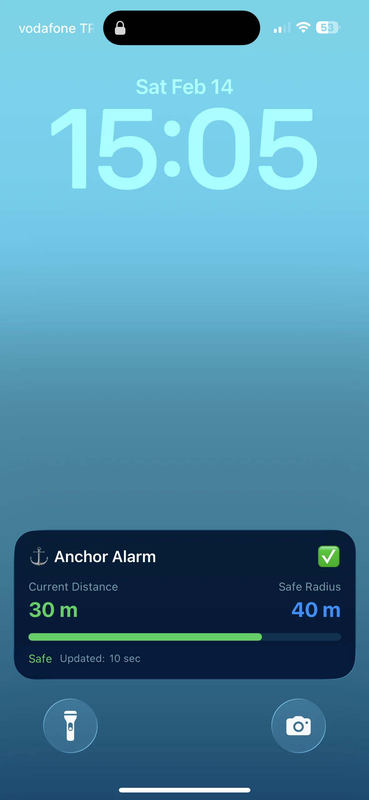 iOS lock screen widget showing anchor alarm status